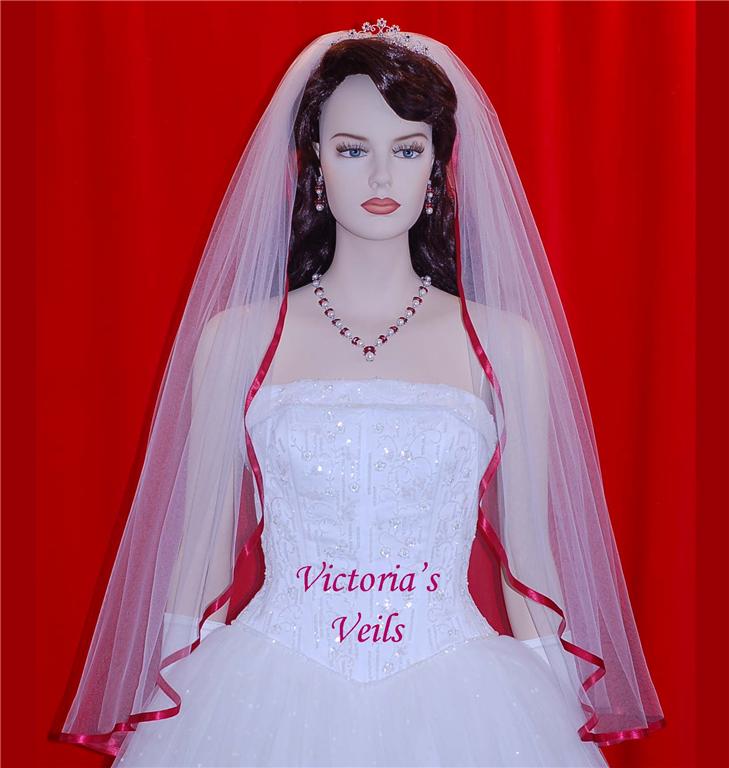 Affordable wedding veil with apple red trim