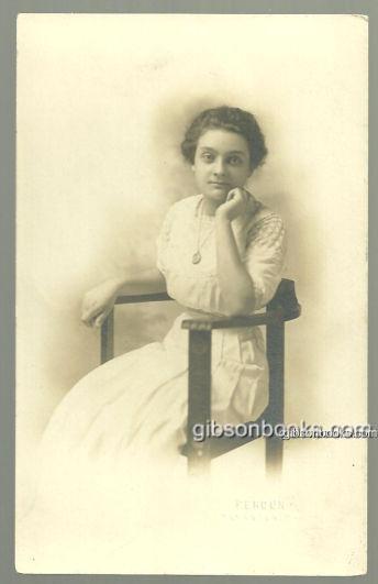 Image for REAL PHOTO POSTCARD OF LOVELY LADY SITTING IN CHAIR