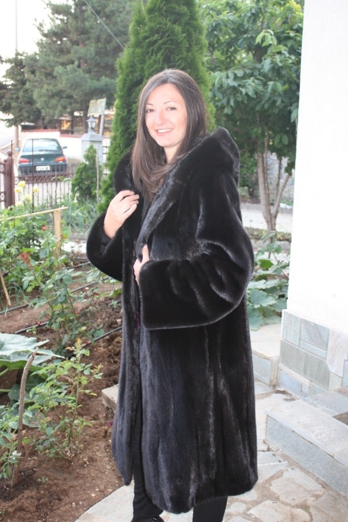 image of balck mink fur coat full length side view