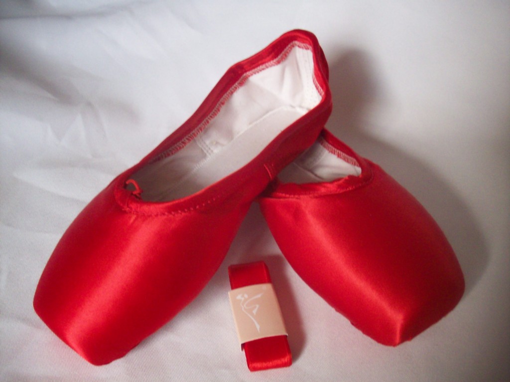 red ballet shoes with ribbons