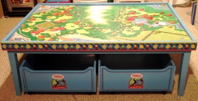 wooden train set with table and drawers