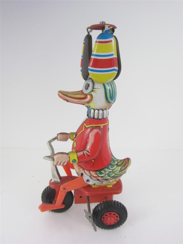Wind up Mechanical West Germany Tin Toy Duck on Bicycle Bike 1960's See