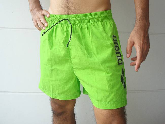 Lime green swim shorts 83% nylon / 17% spandex shiny swimwear tricot. Actual swimwear colors may vary from one computer monitor to another. It is not easy to show exact colors on a website.