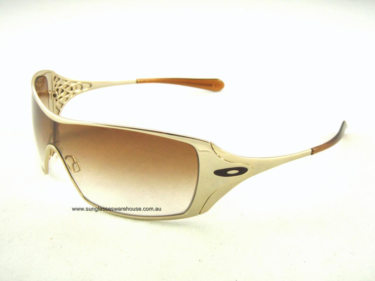 GOLD OAKLEY DART 05-663 SUNGLASSES - Picture 1 of 1