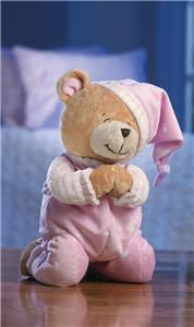 praying stuffed bear