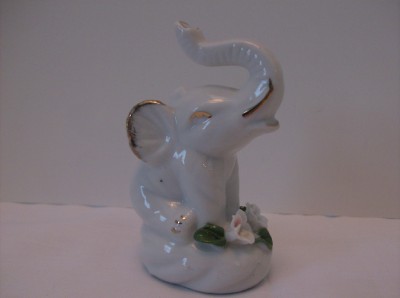 white porcelain elephant figurine