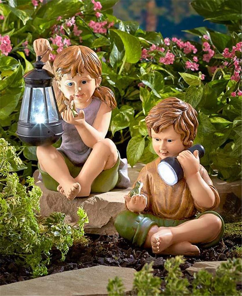 CHARMING KIDS BOY AND/OR GIRL SOLAR AUTO ON LIGHTED GARDEN STATUE LAWN