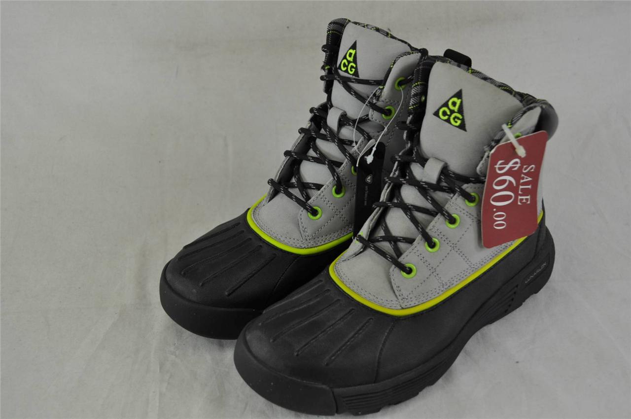 black and silver nike boots
