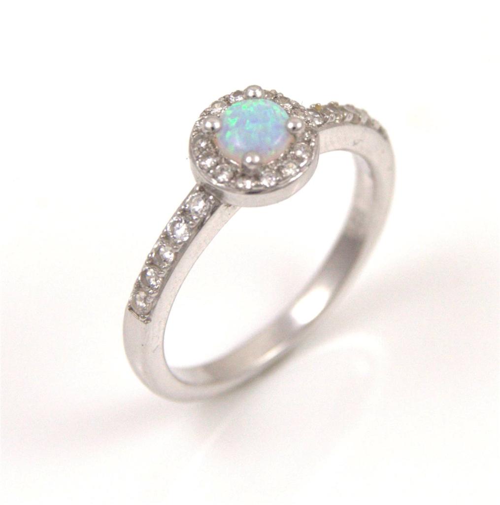 ... Diamond-Unique Opal Solid Silver Rhodium platinum Halo Ring (27816P