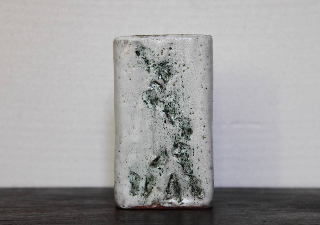 Unmarked rectangular vase.