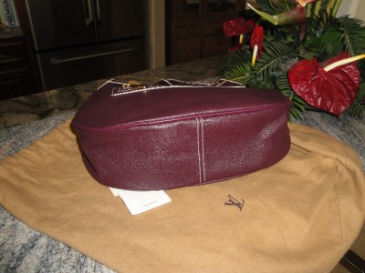 buy louis vuitton clutches