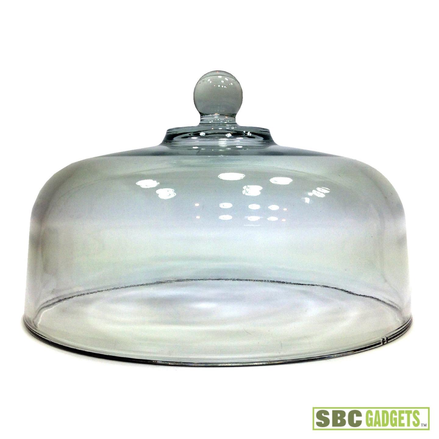 Glass Dome Cover I paired this Glass Dome Cloche with a Green Speckled dish By Country Croc Stoneware. The Glass dome fits perfectly inside this. You can Dress this up for any decoration as shown or put Fruit, Cheese.