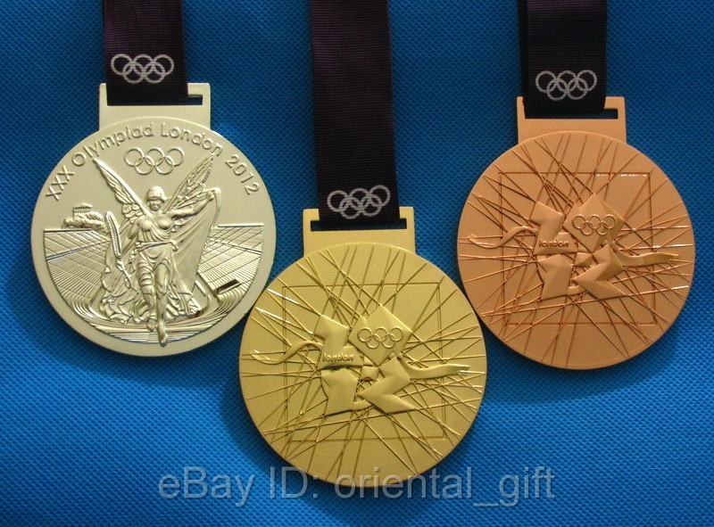 The History Of Gold Silver Bronze Olympic Medals vrogue.co