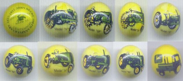 A Lot of 2 JohnDeere Tractor Logos Advertising Glass Marbles 