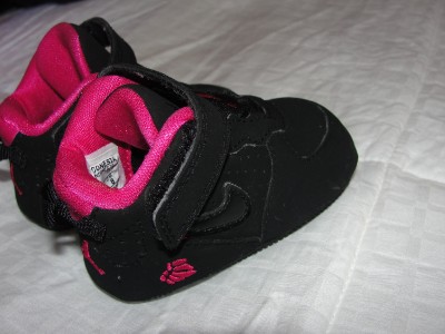 pink and black baby jordans