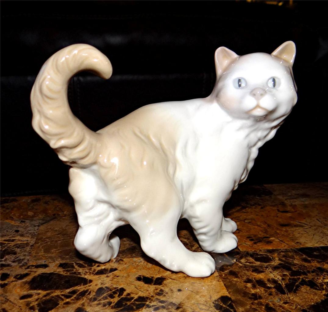 lladro cats in basket