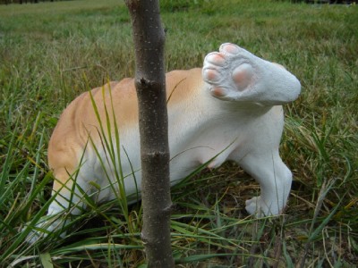 peeing dog garden statue