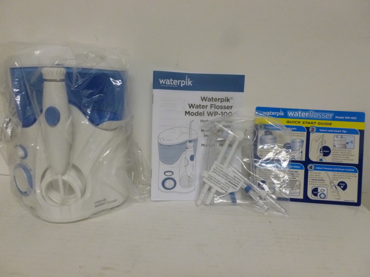 NEW! Waterpik Ultra Water Flosser WP100 With 8 Accessory Tips! eBay