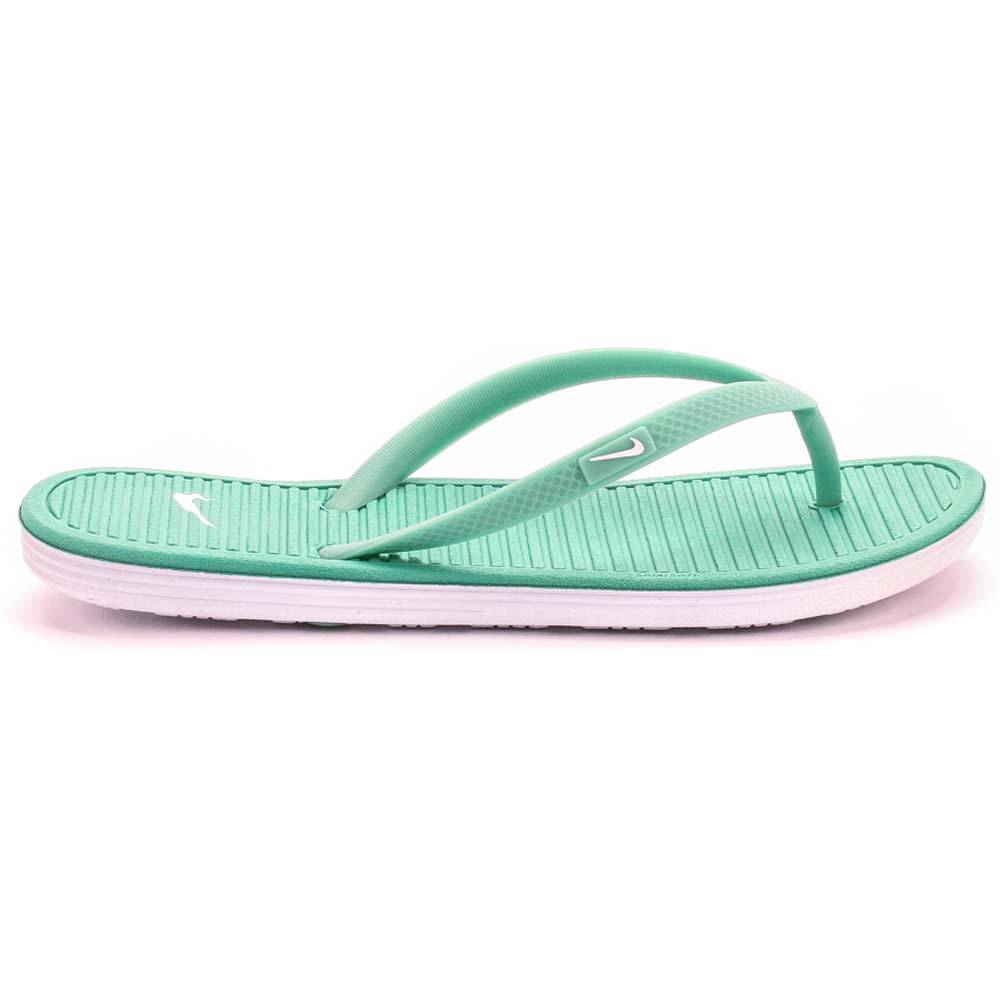 mint green nike flip flops