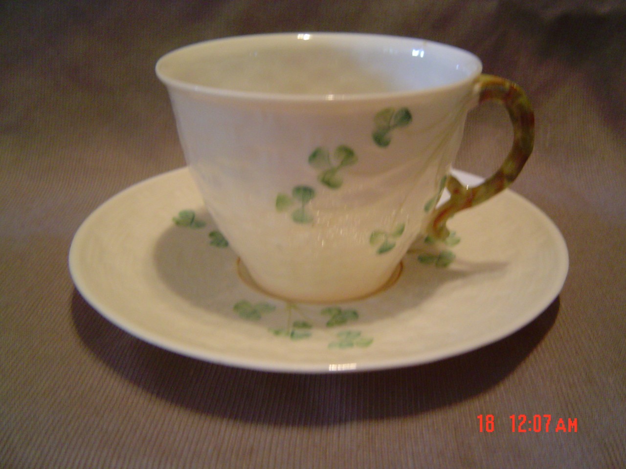 BELLEEK CHINA CUP AND SAUCER  6TH GR MARK