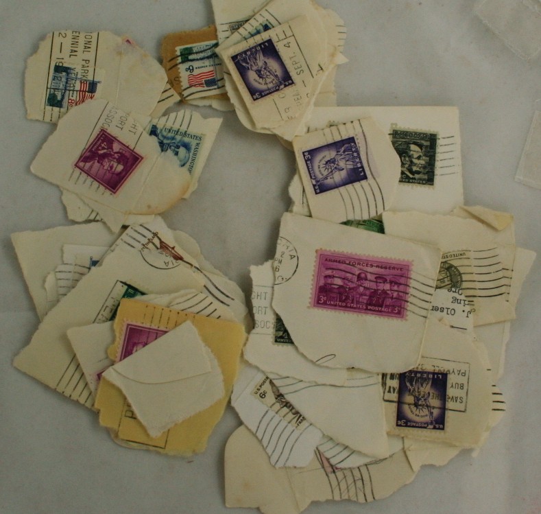 vintage postage stamps,stamps,cut squares, stamps on paper, postmarks