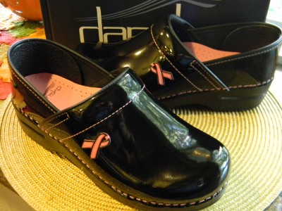 dansko black patent leather clogs