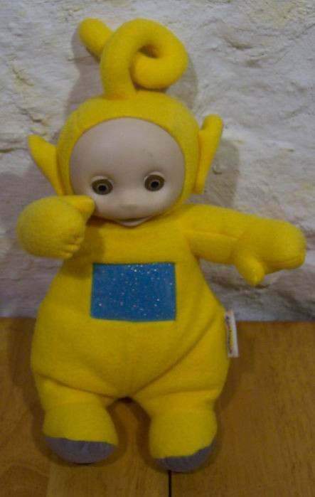 yellow teletubby doll