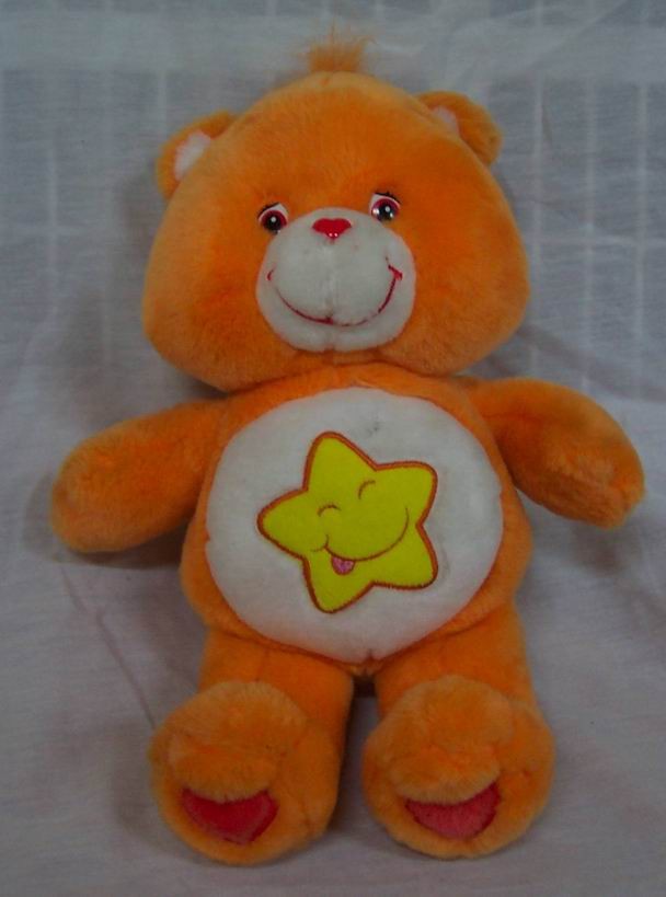 orange care bear with a star