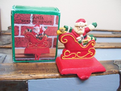 cast iron christmas stocking hanger