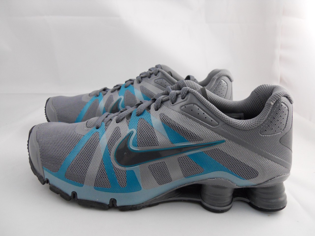 black and grey nike shox