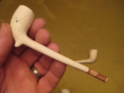 three vintage style collectable unused clay pipes