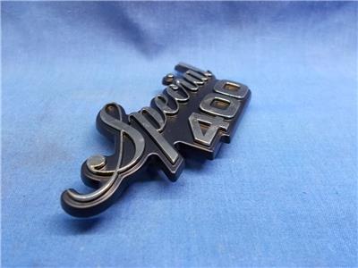 Yamaha 3F9-21782-00. OEM RH Side Cover Emblem. 