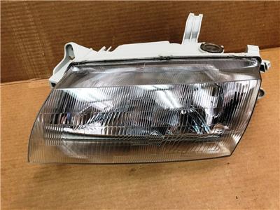 TYC Fits: 1997-1998 Mazda Protege Sedan Left Driver Side Headlight