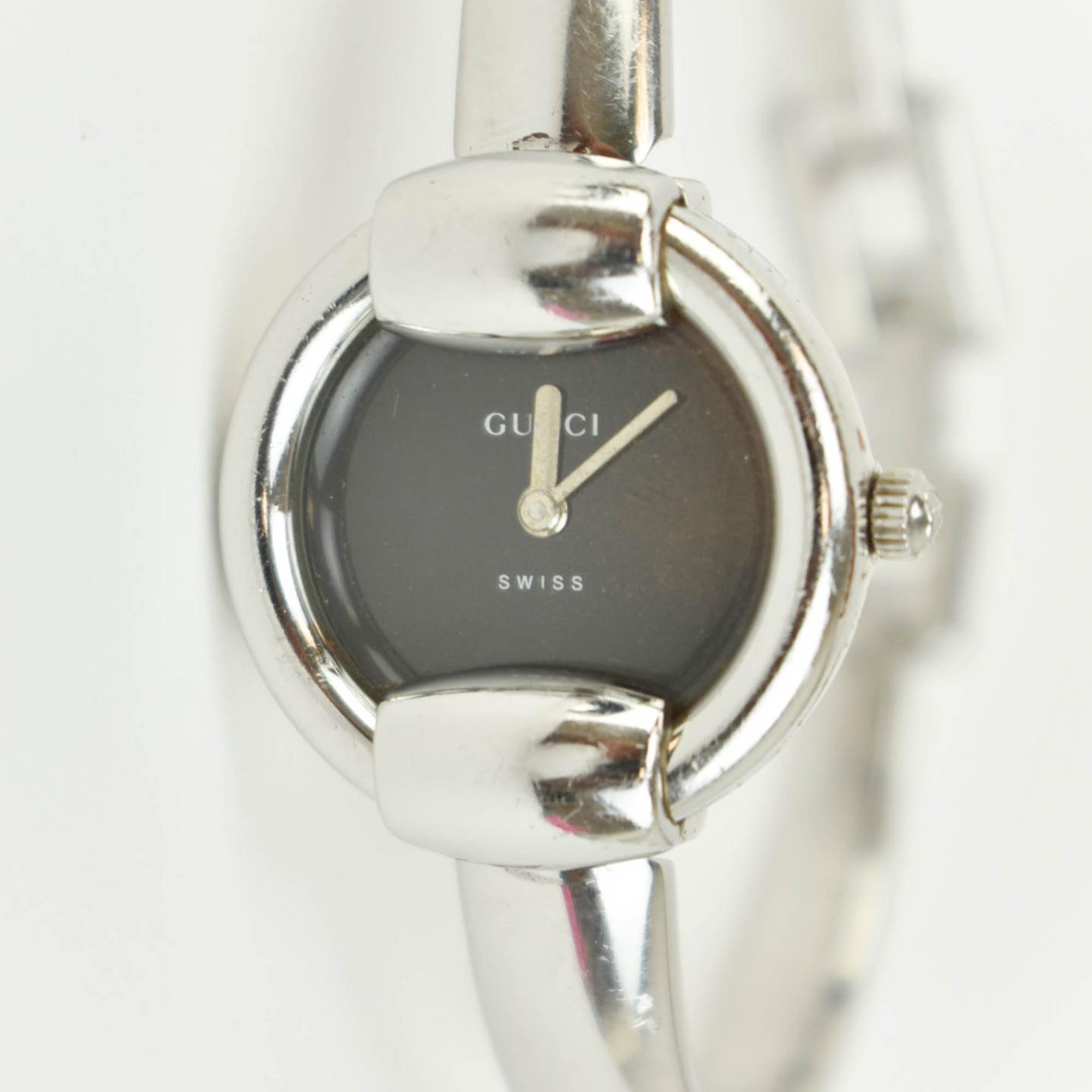 gucci 1400l silver watch price