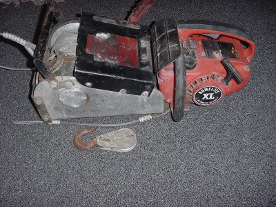 Powered portable chainsaw winch + homelite chain SAW lewis rule.