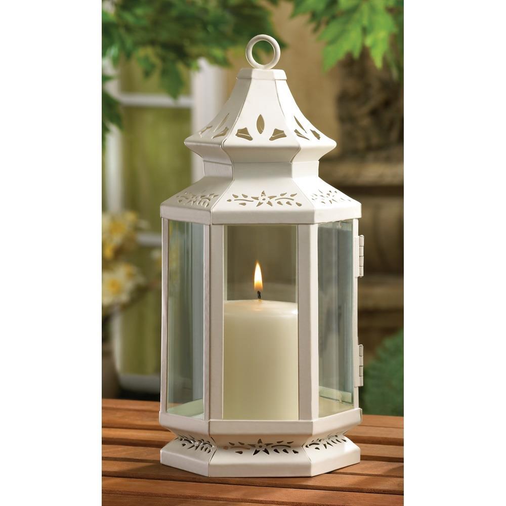 white candle holders wedding centerpieces