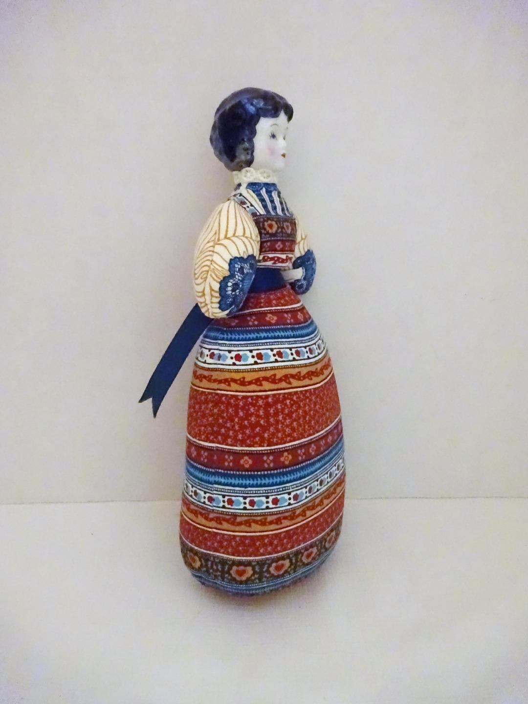 avon porcelain head doll
