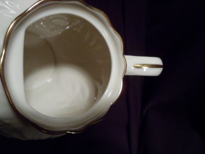 lenox teapot, cream colored with gold trim, cottage collection