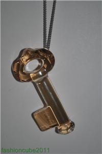New With Box Swarovski Medium Golden Shadow Key Pendant