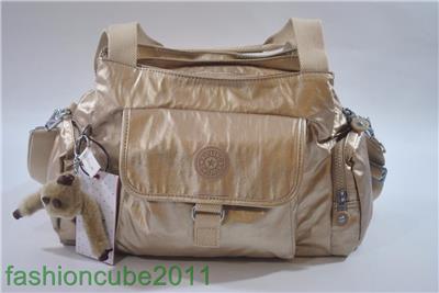 kipling toasty gold