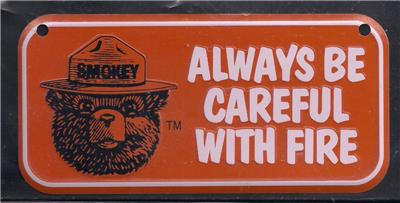 smokey the bear metal license plat / plaque topper careful with