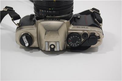 Read Nikon FM-10 SLR Camera with 35-70mm 1:5-4.8 Zoom Lens