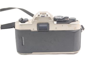 Read Nikon FM-10 SLR Camera with 35-70mm 1:5-4.8 Zoom Lens