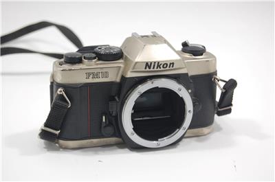 Read Nikon FM-10 SLR Camera with 35-70mm 1:5-4.8 Zoom Lens