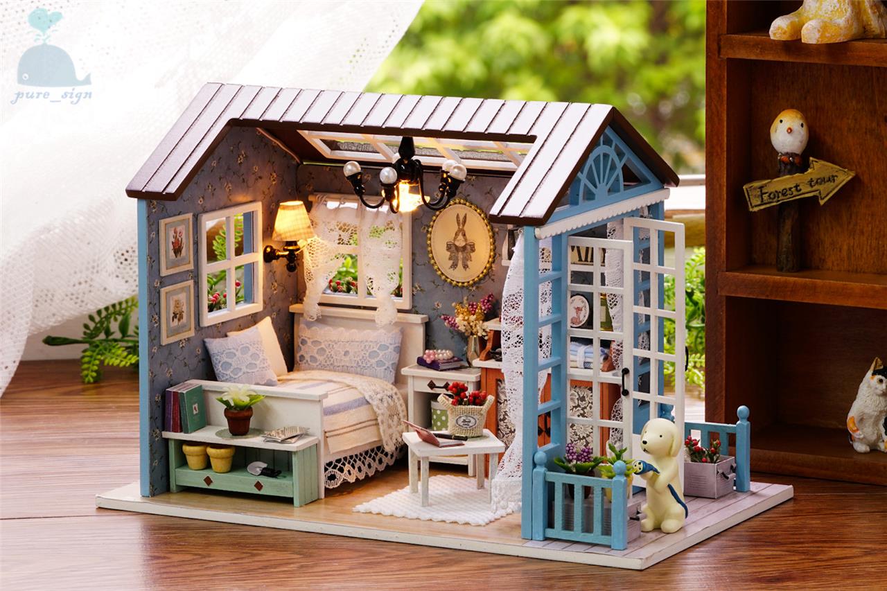 blue wooden dolls house