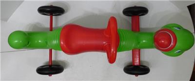 green inchworm ride on toy
