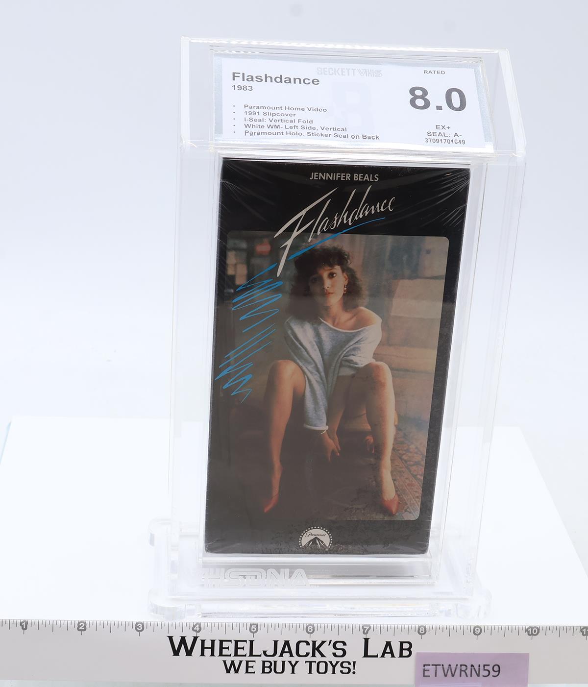 Flashdance 1983,1991 Slipcover Hologram Sticker Seal Beckett 8.0 / A- VHS