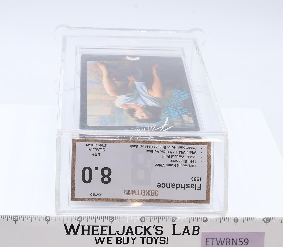 Flashdance 1983,1991 Slipcover Hologram Sticker Seal Beckett 8.0 / A- VHS