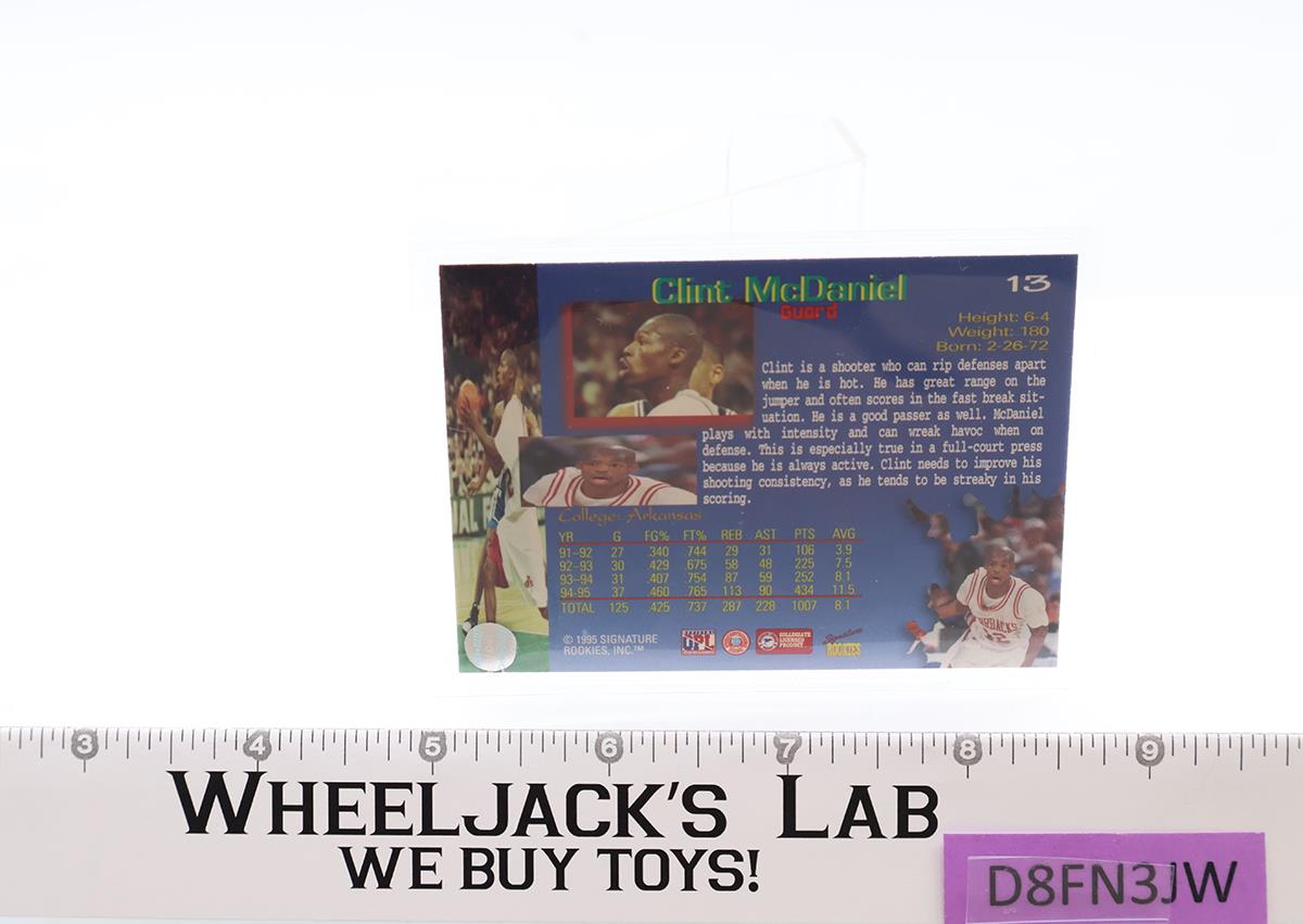 Clint McDaniel Draft Day AUTOGRAPHED 1995 Signature Rookies NBL Trading Card