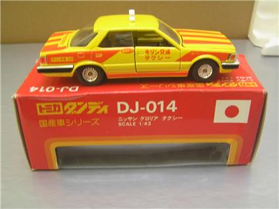 Tomica Dandy DJ-014 Nissan Gloria Taxi scarce yellow color 1